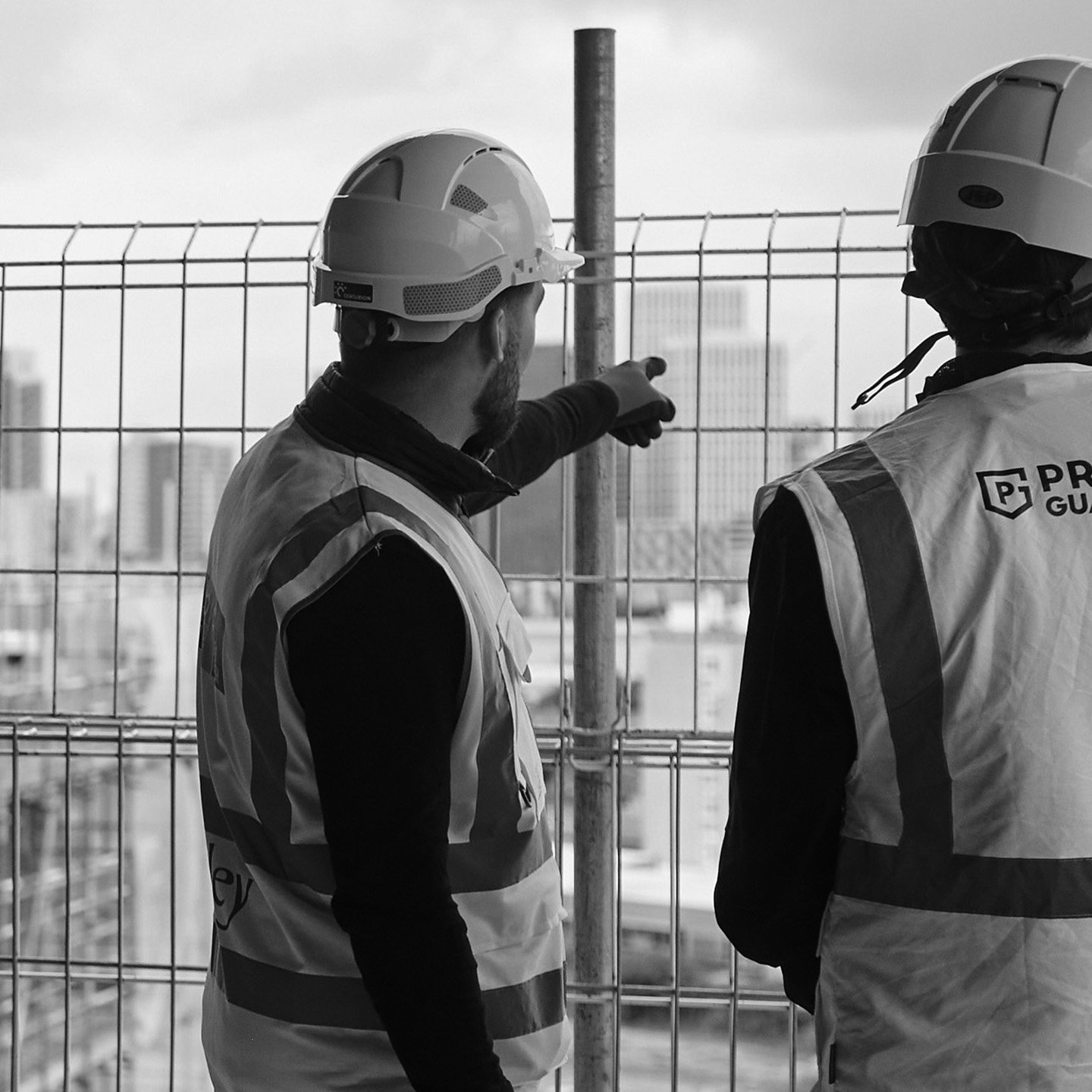 Premier Guarantee Surveyor talking to client on building site