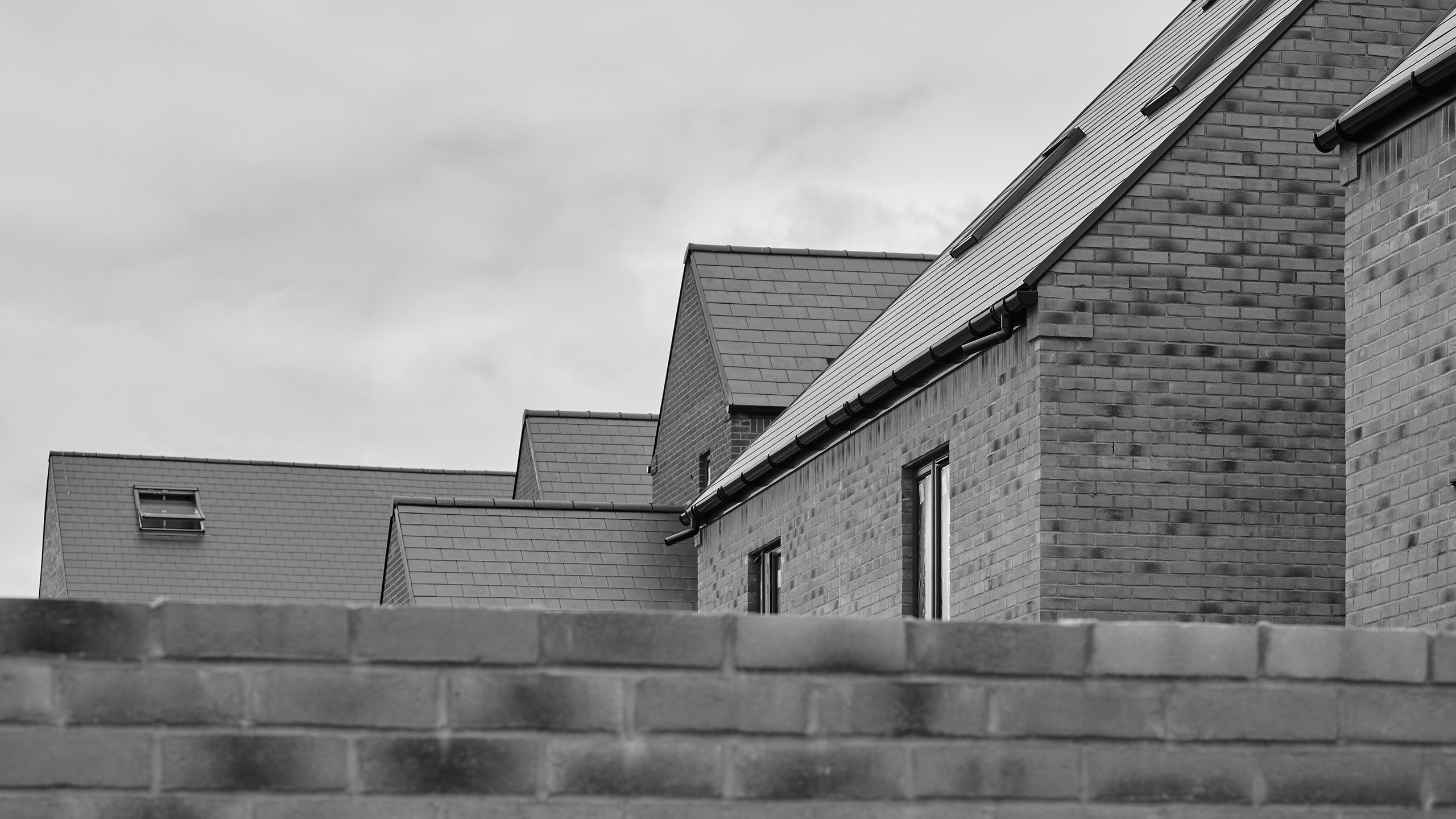 Housing Associations Black and white image of a colourful social housing development