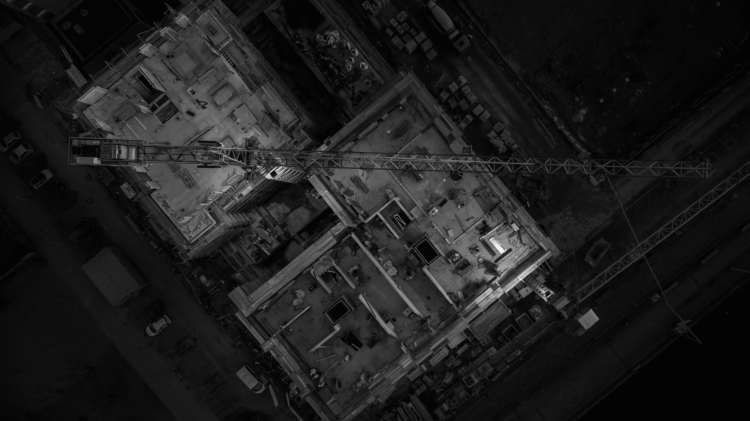 High Rise Developers Aerial view of a high rise development under construction in black and white