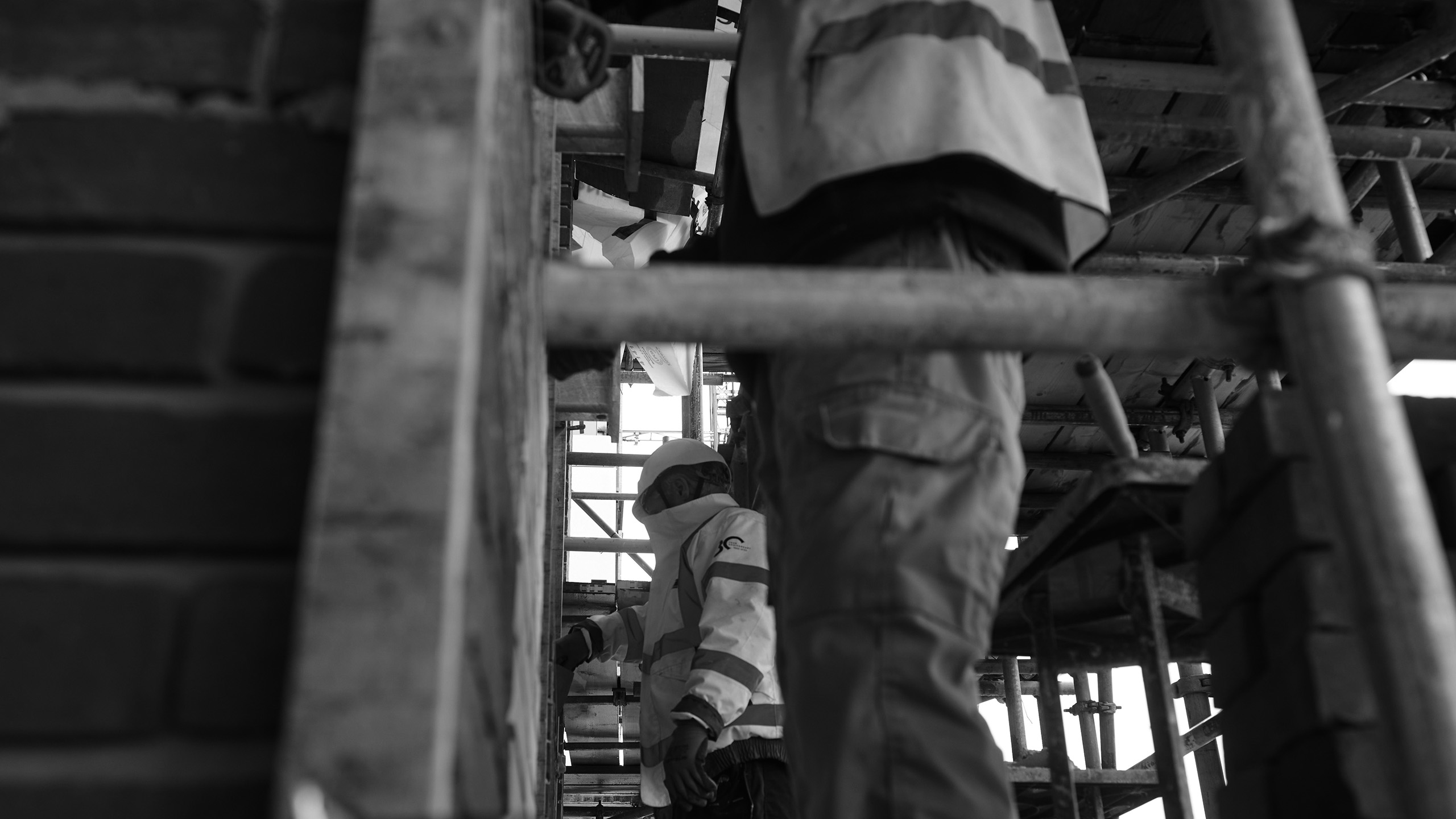 Services Workers on a construction site in black and white