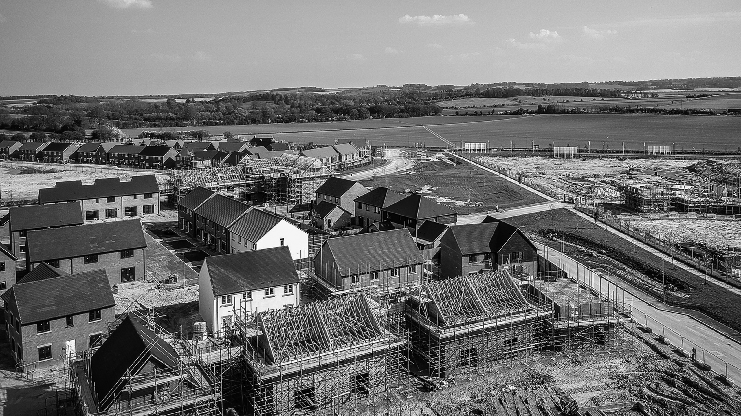 New Homes Structural Warrranty Black and white image of aerial view of new homes developmets