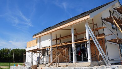 Extensions and Alterations Image showing an example of a house extension being built