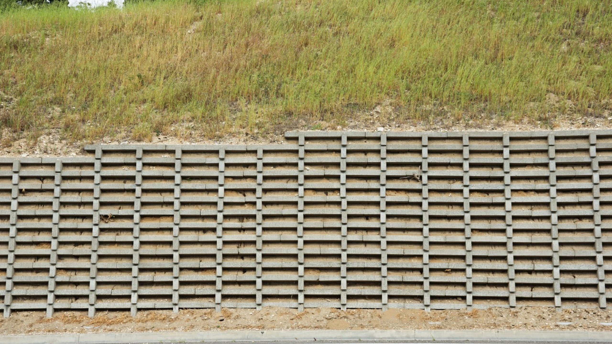Landscaped Wall Of Cement Cobblestone Bricks stock photo