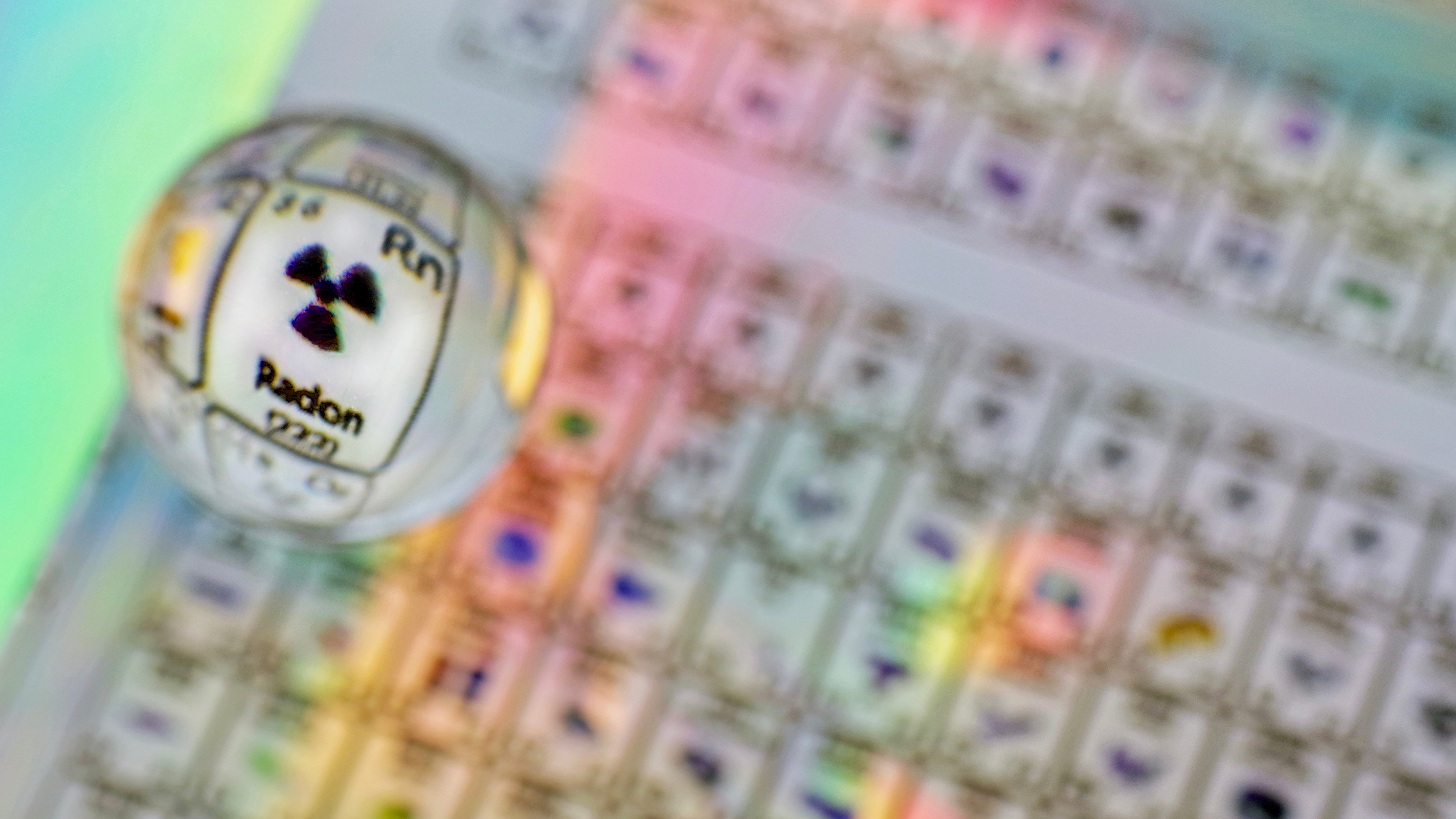 Close-up of Radon (Rn) on the Periodic Table – Radioactive Element Highlight Close-up view of the periodic table with a magnified focus on Radon (Rn), showing its symbol, atomic number 86, and radiation hazard symbol.