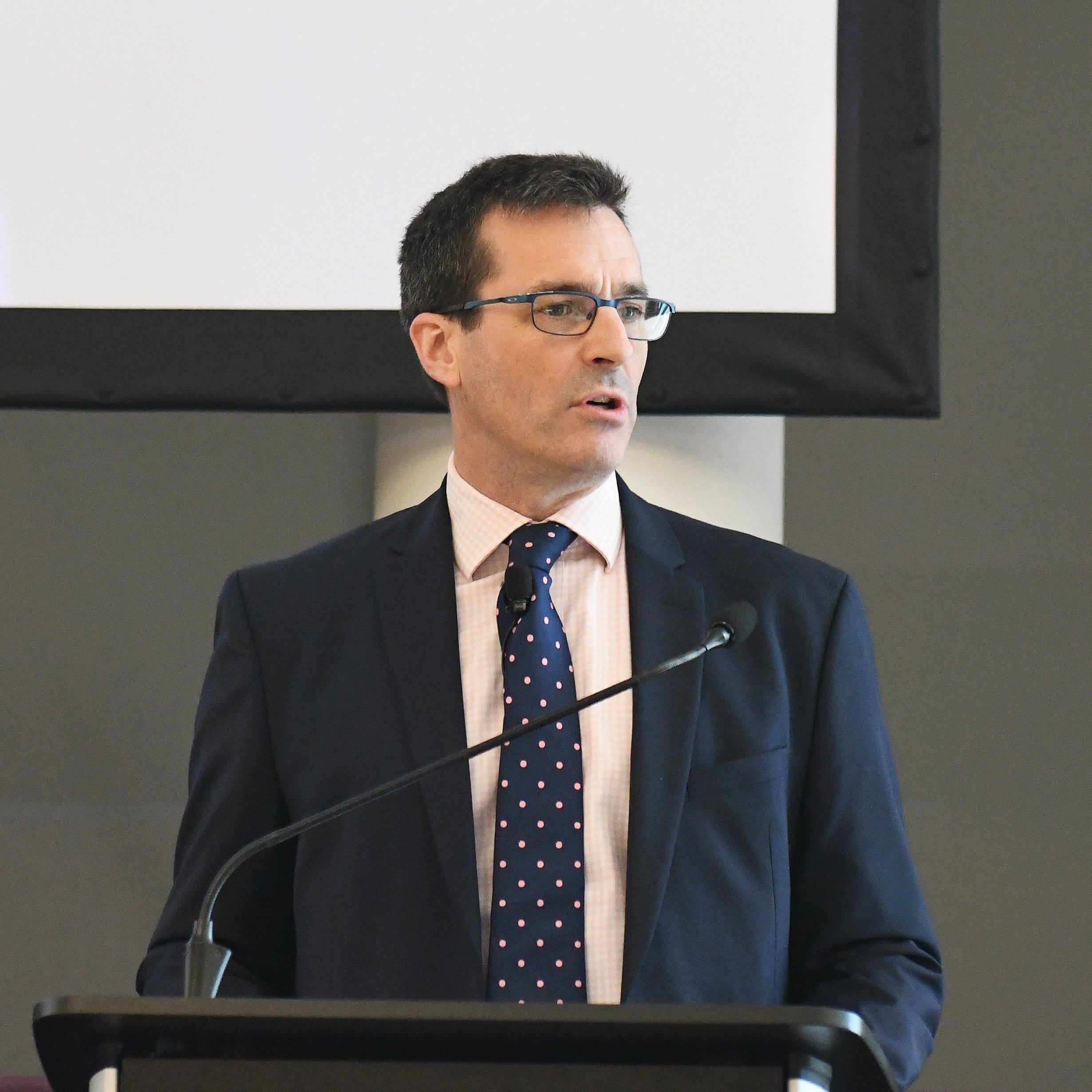 An image of a Cameron Hall Homes site team and Premier Guarantee surveyor